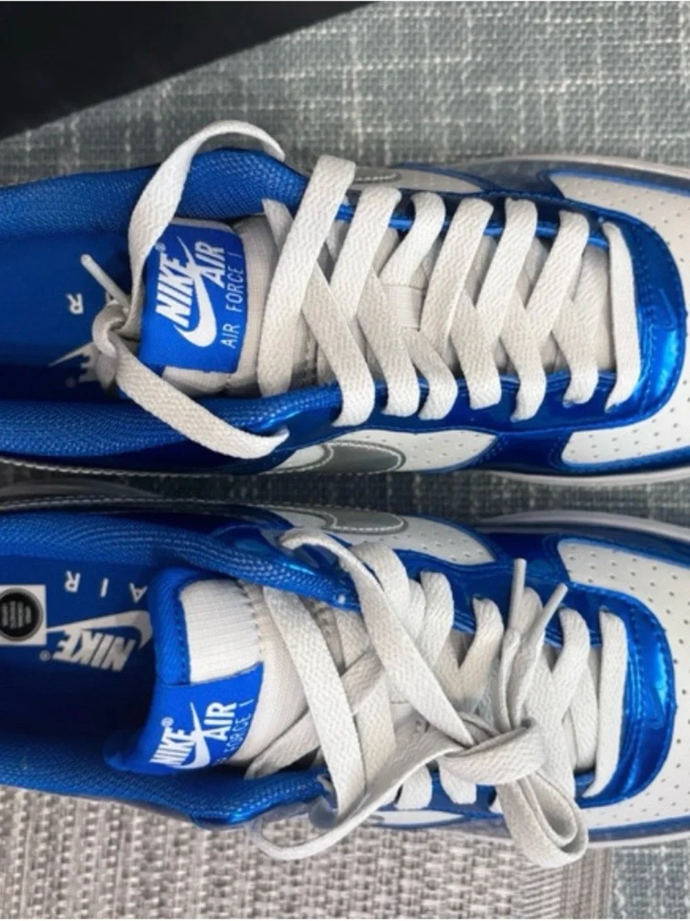 Nike Low-Top Sneakers in Bright Blue and White with Iridescent Swoosh